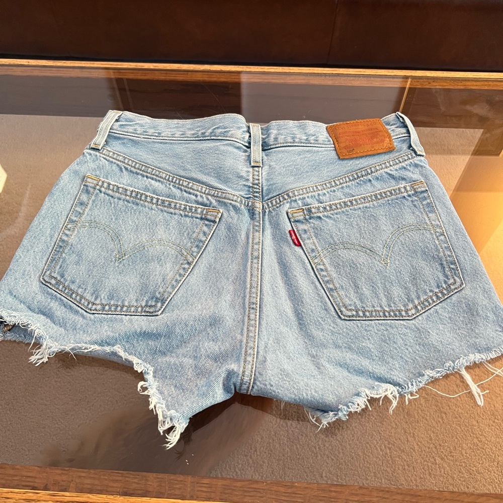 Levi 501 shorts with distressing